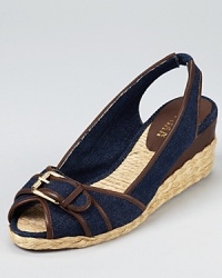 In dark denim with a walkable heel, these Lauren Ralph Lauren wedges beckon off-duty days and picnics in the park. In dark denim with a walkable heel, these Lauren Ralph Lauren wedges beckon off-duty days and picnics in the park.