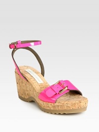 Natural cork wedge with a faux patent leather upper, finished with an adjustable ankle strap and buckle detail. Cork and rubber wedge, 3 (75mm)Cork and rubber platform, 1 (25mm)Compares to a 2 heel (50mm)Faux patent leather upperCork liningRubber solePadded insoleImportedOUR FIT MODEL RECOMMENDS ordering true size. Natural cork wedge with a faux patent leather upper, finished with an adjustable ankle strap and buckle detail. Cork and rubber wedge, 3 (75mm)Cork and rubber platform, 1 (25mm)Compares to a 2 heel (50mm)Faux patent leather upperCork liningRubber solePadded insoleImportedOUR FIT MODEL RECOMMENDS ordering true size.