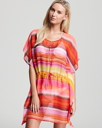 Electric colors light up this sheer striped cover up from Echo. Electric colors light up this sheer striped cover up from Echo.