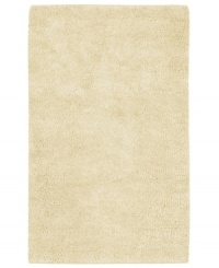 Step into ultimate softness with this opulent area rug, hand-woven with sumptuous New Zealand felted wool. In a cool ivory tone, this lush piece fits both traditional and contemporary decor. Step into ultimate softness with this opulent area rug, hand-woven with sumptuous New Zealand felted wool. In a cool ivory tone, this lush piece fits both traditional and contemporary decor.