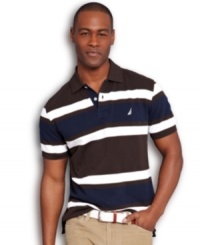 By land or by sea, this striped polo shirt from Nautica will keep you anchored in style. By land or by sea, this striped polo shirt from Nautica will keep you anchored in style.