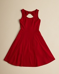 With a contoured bodice and lovely flared skirt, this classic skater dress adds a cute cutaway with a bow detail at the upper back. With a contoured bodice and lovely flared skirt, this classic skater dress adds a cute cutaway with a bow detail at the upper back.