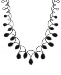 Onyx gets the teardrop treatment to glamorous effect. Genevieve & Grace's necklace, set in sterling silver, also features marcasite to enhance the appeal. Approximate length: 17 inches. Approximate drop: 1-3/8 inches. Onyx gets the teardrop treatment to glamorous effect. Genevieve & Grace's necklace, set in sterling silver, also features marcasite to enhance the appeal. Approximate length: 17 inches. Approximate drop: 1-3/8 inches.