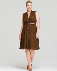 Approach the tribal trend with ladylike sophistication in this Jones New York Collection Plus dress. A natural palette enlivens a fit-and-flare silhouette, while a faux leather belt lends a feminine finish. Approach the tribal trend with ladylike sophistication in this Jones New York Collection Plus dress. A natural palette enlivens a fit-and-flare silhouette, while a faux leather belt lends a feminine finish.