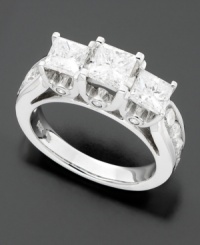 Proof that dazzling diamonds are always in style! Three princess-cut diamonds (3 ct. t.w.) are showcased on a shimmering high gallery for an overall jaw-dropping look. Three stone ring set in elegant 14k white gold. Proof that dazzling diamonds are always in style! Three princess-cut diamonds (3 ct. t.w.) are showcased on a shimmering high gallery for an overall jaw-dropping look. Three stone ring set in elegant 14k white gold.