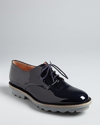 Robert Clergerie gives the oxford trend polish in these stylish lace ups, grounded with rugged, rubber soles. Robert Clergerie gives the oxford trend polish in these stylish lace ups, grounded with rugged, rubber soles.