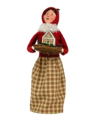 Start every holiday season on a sweet note. This rosy-cheeked woman is bundled tight, caroling door to door and delivering yummy treats with the rest of the Gingerbread Family figurines, all handcrafted by Byers' Choice. Start every holiday season on a sweet note. This rosy-cheeked woman is bundled tight, caroling door to door and delivering yummy treats with the rest of the Gingerbread Family figurines, all handcrafted by Byers' Choice.
