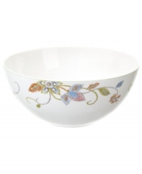 Well-crafted blooms create the illusion of texture on the sleek white porcelain of Oleg Cassini's Kavita vegetable bowl. A charming complement to the dinnerware collection.