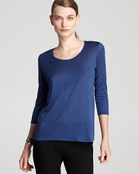 A vivid jewel tone lends luxe appeal to a classic Eileen Fisher tee. Set off the shade with golden accents and turn heads in brilliant color. A vivid jewel tone lends luxe appeal to a classic Eileen Fisher tee. Set off the shade with golden accents and turn heads in brilliant color.