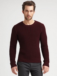 Merino wool makes this classic crewneck irresistible.CrewneckPull-on styleRibbed trimMerino woolDry cleanImported of Italian fabric