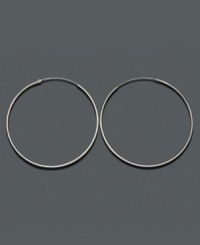 A wardrobe staple that outlives seasons, trends and time. Crafted in sterling silver, endless hoop earrings by Unwritten hook invisibly. Approximate diameter: 2-1/4 inches. A wardrobe staple that outlives seasons, trends and time. Crafted in sterling silver, endless hoop earrings by Unwritten hook invisibly. Approximate diameter: 2-1/4 inches.