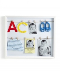 Get hung up on your little one's adorable beginnings with an Umbra picture frame that doubles as a shadowbox. Two lines and a dozen clothespins mean you can give more than a snapshot into his first years. Get hung up on your little one's adorable beginnings with an Umbra picture frame that doubles as a shadowbox. Two lines and a dozen clothespins mean you can give more than a snapshot into his first years.