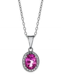 Pretty in pink. Victoria Townsend's polished pendant features an oval-cut pink topaz (1-1/8 ct. t.w.) surrounded by diamond accents. Set in sterling silver. Approximate length: 18 inches. Approximate drop: 3/4 inch. Pretty in pink. Victoria Townsend's polished pendant features an oval-cut pink topaz (1-1/8 ct. t.w.) surrounded by diamond accents. Set in sterling silver. Approximate length: 18 inches. Approximate drop: 3/4 inch.