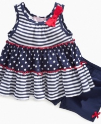 She'll be prepped and ready to play in sweet patterns with this fun tank and short set from Kids Headquarters. She'll be prepped and ready to play in sweet patterns with this fun tank and short set from Kids Headquarters.