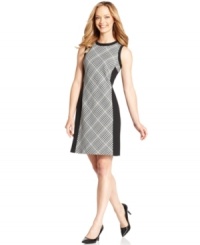 Evan Picone's petite dress features a bold take on a houndstooth print at the front and a classic A-line silhouette. Evan Picone's petite dress features a bold take on a houndstooth print at the front and a classic A-line silhouette.