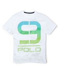 Accented with a bold, multi-hued 9, an active tee is crafted from cotton jersey for breathability and easy movement during athletic endeavors. Accented with a bold, multi-hued 9, an active tee is crafted from cotton jersey for breathability and easy movement during athletic endeavors.