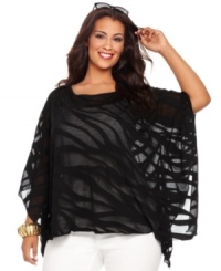 Score on-trend safari style with Seven Jeans' batwing sleeve plus size top, featuring a burnout zebra print. Score on-trend safari style with Seven Jeans' batwing sleeve plus size top, featuring a burnout zebra print.