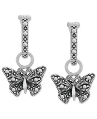 Soar to new heights of style. These drop earrings from Genevieve & Grace are set in sterling silver with marcasite adding luster to the butterfly motif. Approximate drop length: 1 inch. Approximate drop width: 1/2 inch.