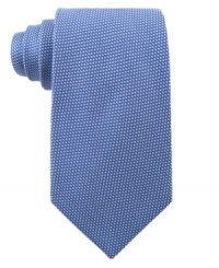 Fine dots add the right amount of texture to this smooth silk tie from Michael Kors. Fine dots add the right amount of texture to this smooth silk tie from Michael Kors.