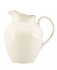 With fanciful beading and a feminine edge, this pitcher from the Lenox French Perle white dinnerware collection has an irresistibly old-fashioned sensibility. Hard-wearing stoneware is dishwasher safe and, in a soft white hue with antiqued trim, a graceful addition to everyday dining.