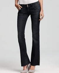 Slung low on the hips, these subtly faded Hudson bootcut jeans evoke a too-cool rocker vibe. Slung low on the hips, these subtly faded Hudson bootcut jeans evoke a too-cool rocker vibe.