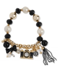 Take a picture, it'll last longer. Betsey Johnson's half-stretch bracelet features gold and black tone bracelet chains, crystal cup chain accent, multi-bead stretch chain, black camera charm with gold tone details and crystal accent, round crystal, black mesh bow with glass pearl, gold tone bow with striped bead and black tone multi-chain fringe. Approximate length: 7-1/2 inches. Take a picture, it'll last longer. Betsey Johnson's half-stretch bracelet features gold and black tone bracelet chains, crystal cup chain accent, multi-bead stretch chain, black camera charm with gold tone details and crystal accent, round crystal, black mesh bow with glass pearl, gold tone bow with striped bead and black tone multi-chain fringe. Approximate length: 7-1/2 inches.