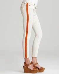 Contrast stripes down the legs add a pop of color to these Hudson skinny jeans. Contrast stripes down the legs add a pop of color to these Hudson skinny jeans.