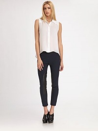 Sporty-chic elevated with rich leather insets, all in a sleek, stretchy cropped-leg style.Elastic waistbandZip pocketsLeather insetsPull-on styleRise, about 8Inseam, about 2866% cotton/27% nylon/7% elastaneDry cleanMade in USA of imported fabricModel shown is 5'10 (177cm) wearing US size 4. Sporty-chic elevated with rich leather insets, all in a sleek, stretchy cropped-leg style.Elastic waistbandZip pocketsLeather insetsPull-on styleRise, about 8Inseam, about 2866% cotton/27% nylon/7% elastaneDry cleanMade in USA of imported fabricModel shown is 5'10 (177cm) wearing US size 4.