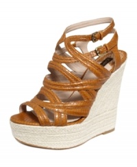 Stand tall in the Sibey wedges by Joan and David. They're ultra strappy with a tall, yet walkable wedge. Stand tall in the Sibey wedges by Joan and David. They're ultra strappy with a tall, yet walkable wedge.
