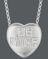 Won't you be my Valentine? Sweethearts' adorable heart-shaped pendant expresses more that just great style with the words BE MINE written in round-cut diamonds (1/8 ct. t.w.) across the surface. Pendant crafted in sterling silver. Copyright © 2011 New England Confectionery Company. Approximate length: 16 inches + 2-inch extender. Approximate drop: 5/8 inch. Won't you be my Valentine? Sweethearts' adorable heart-shaped pendant expresses more that just great style with the words BE MINE written in round-cut diamonds (1/8 ct. t.w.) across the surface. Pendant crafted in sterling silver. Copyright © 2011 New England Confectionery Company. Approximate length: 16 inches + 2-inch extender. Approximate drop: 5/8 inch.