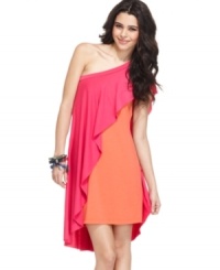 A bright overlay drapes this one-shoulder sheath dress, creating a dramatic, colorblocked experience! From REIGN. A bright overlay drapes this one-shoulder sheath dress, creating a dramatic, colorblocked experience! From REIGN.