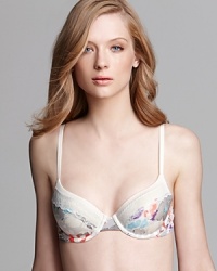 Match your sweet side in a pretty floral printed demi bra from Calvin Klein. Match your sweet side in a pretty floral printed demi bra from Calvin Klein.