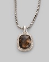 From the Noblesse Collection. An elegant faceted smokey quartz is edged in pavé diamonds and hangs on a sterling silver cable chain. Smokey quartz Diamonds, 0.3 tcw Sterling silver Chain length adjusts from about 16 to 17 Pendant width, about ½ Lobster clasp Made in USA