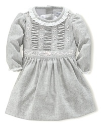 A soft brushed twill sets the foundation for this charming girly dress with pretty-in-pink floral stitching, ruched detailing and lace trim. A soft brushed twill sets the foundation for this charming girly dress with pretty-in-pink floral stitching, ruched detailing and lace trim.