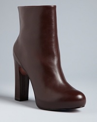 Perfect for play or work, these polished booties combine clean design with stylish lines, for a finished product that's both neutral and now. Perfect for play or work, these polished booties combine clean design with stylish lines, for a finished product that's both neutral and now.