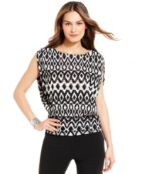 A digitized tribal print gives this chic petite top from Alfani its contemporary appeal. Sophisticated accessories keep it pretty and polished for work. A digitized tribal print gives this chic petite top from Alfani its contemporary appeal. Sophisticated accessories keep it pretty and polished for work.