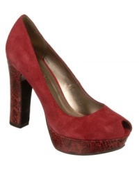 Add a touch of edge to your look with Fergie's Maiden platform peep toe pumps. They're luxurious with a subtle snake print. Add a touch of edge to your look with Fergie's Maiden platform peep toe pumps. They're luxurious with a subtle snake print.