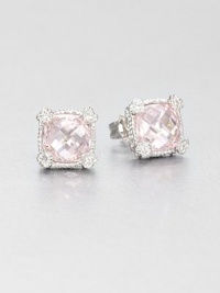 Beautifully faceted pink crystal stones set in intricately designed, sterling silver accented with dazzling white sapphires. Pink crystalSterling silverWhite sapphiresSize, about .4Post backImported