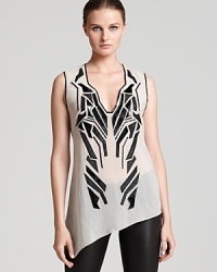 Update your capsule collection with this day-to-night Helmut Lang top with elegant appliqué detail at the front and a gorgeous sheer texture. Update your capsule collection with this day-to-night Helmut Lang top with elegant appliqué detail at the front and a gorgeous sheer texture.