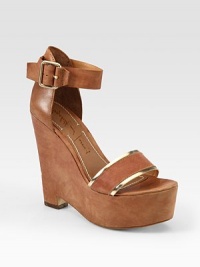 Super-soft leather wedge has glimmering metallic leather trim and an adjustable ankle strap. Self-covered wedge, 5 (125mm)Covered platform, 2 (50mm)Compares to a 4 heel (100mm)Leather and metallic leather upperLeather lining and solePadded insoleImportedOUR FIT MODEL RECOMMENDS ordering one half size up as this style runs small. Super-soft leather wedge has glimmering metallic leather trim and an adjustable ankle strap. Self-covered wedge, 5 (125mm)Covered platform, 2 (50mm)Compares to a 4 heel (100mm)Leather and metallic leather upperLeather lining and solePadded insoleImportedOUR FIT MODEL RECOMMENDS ordering one half size up as this style runs small.