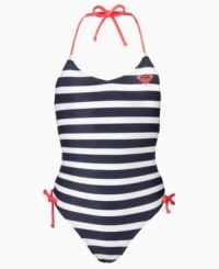 Set for summer. In this chic striped one-piece swimsuit from Roxy, she'll be ready to hit the beach in playful style. Set for summer. In this chic striped one-piece swimsuit from Roxy, she'll be ready to hit the beach in playful style.