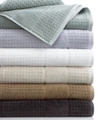 Crafted with plush combed Turkish cotton, this Hammam bath towel features a jacquard woven textured waffle pattern for a luxuriously soft hand that will wrap you in warmth after every shower. Choose from an array of cool and neutral hues. Crafted with plush combed Turkish cotton, this Hammam bath towel features a jacquard woven textured waffle pattern for a luxuriously soft hand that will wrap you in warmth after every shower. Choose from an array of cool and neutral hues.