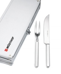 When big holidays roll around or feasting is upon you take charge of the carving with a professional stainless steel knife and fork set that delivers precision slicing for an always impressive presentation. Store in the attractive metal box for convenience. Lifetime warranty. When big holidays roll around or feasting is upon you take charge of the carving with a professional stainless steel knife and fork set that delivers precision slicing for an always impressive presentation. Store in the attractive metal box for convenience. Lifetime warranty.