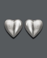 Show your adoration in stylish studs. Crafted in sterling silver, earrings features a sweet, heart-shaped design. Approximate diameter: 1/2 inch. Show your adoration in stylish studs. Crafted in sterling silver, earrings features a sweet, heart-shaped design. Approximate diameter: 1/2 inch.