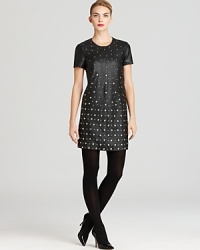 This studded leather French Connection dress offers an uptown meets downtown elegance for party-ready perfection. This studded leather French Connection dress offers an uptown meets downtown elegance for party-ready perfection.