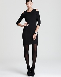 Alluring shoulder cutouts and a body-con silhouette infuse this DKNY dress with provocative edge. Team with sleek monochrome accents for a clean, modern look. Alluring shoulder cutouts and a body-con silhouette infuse this DKNY dress with provocative edge. Team with sleek monochrome accents for a clean, modern look.