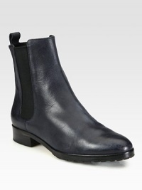 Ultra-soft leather silhouette with elastic gores is a casual-cool urban favorite. Stacked heel 1(25mm) Leather upperBack pull-tab and side elastic goresLeather liningRubber solePadded insoleImported Ultra-soft leather silhouette with elastic gores is a casual-cool urban favorite. Stacked heel 1(25mm) Leather upperBack pull-tab and side elastic goresLeather liningRubber solePadded insoleImported