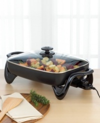This spacious skillet doesn't need a stovetop to cook up delicious dishes. It's electric, so all you have to do is add ingredients and watch it roast, fry, grill, stew, bake and more right on your countertop. The big 16 base has high walls for extra cooking and serving capacity, while a tempered glass lid lets you monitor the food as it cooks. It's even great for use as a buffet server, keeping food warm as you entertain. One-year limited warranty. This spacious skillet doesn't need a stovetop to cook up delicious dishes. It's electric, so all you have to do is add ingredients and watch it roast, fry, grill, stew, bake and more right on your countertop. The big 16 base has high walls for extra cooking and serving capacity, while a tempered glass lid lets you monitor the food as it cooks. It's even great for use as a buffet server, keeping food warm as you entertain. One-year limited warranty.