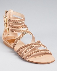 Intricate zigzags laser cut on leather make a statement on these Dolce Vita sandals, the perfect finishing touch to warm-weather looks. Intricate zigzags laser cut on leather make a statement on these Dolce Vita sandals, the perfect finishing touch to warm-weather looks.
