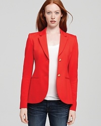 This radiant Theory blazer lends the perfect pop of color with denim in a classic two-button silhouette. This radiant Theory blazer lends the perfect pop of color with denim in a classic two-button silhouette.